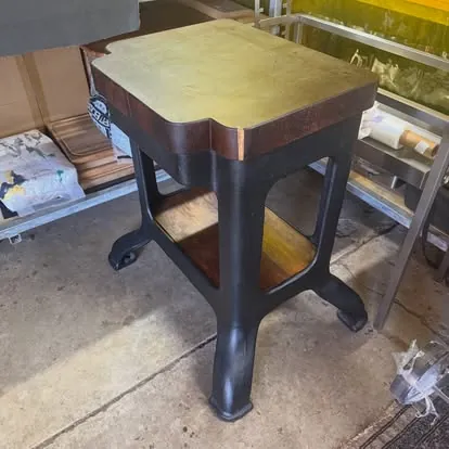 Butcher block: Hardwood shelf below for storage.