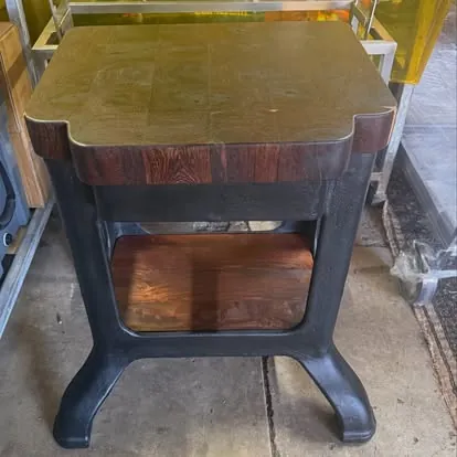 Butcher block: End-grain top on a cast iron base.