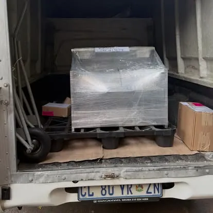 Custom grill wrapped and loaded for delivery